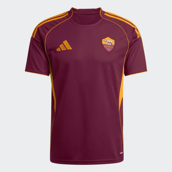 Camiseta Roma Local 25/26 Adidas. Diseño burdeos con detalles dorados. Escudo AS Roma.